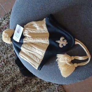 Saints knit pullover with ear flaps warmers, pom, and strings. New with tags